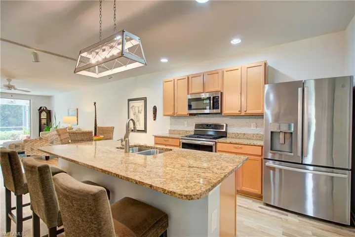 Gorgeous granite countertops and a breakfast bar