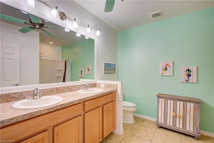 A double vanity in the master bathroom