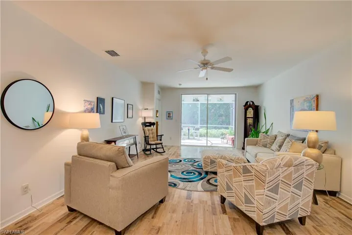 This living room is BIG at 20' x 15'