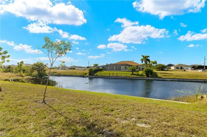 Water view with nearby suburban area