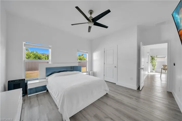 Bedroom featuring light wood-style flooring and ceiling fan