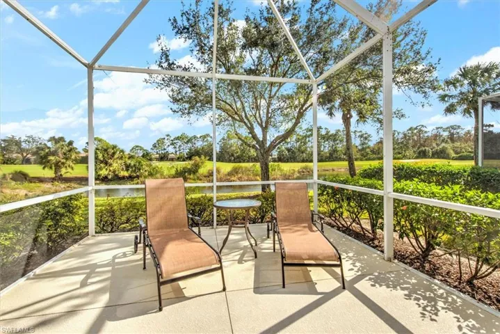 Sunroom featuring a waterview!