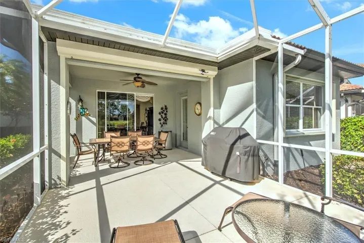 Sun-filled lanai featuring ceiling fan!