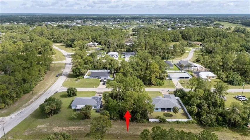View of property location with nearby suburban area