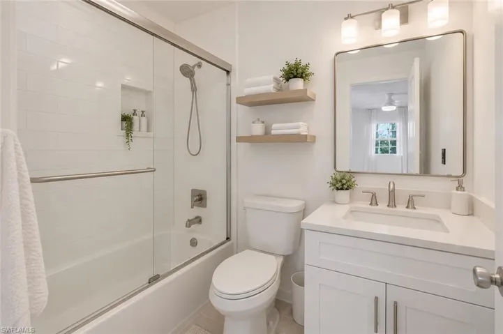 Privacy abounds with front hedge and all surrounding parcels protected by City of Bonita Springs as park area.