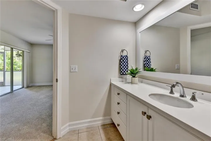 Master Bathroom from Shower looking into Master Bedroom with access to Exterior Lanai (Sunroom)