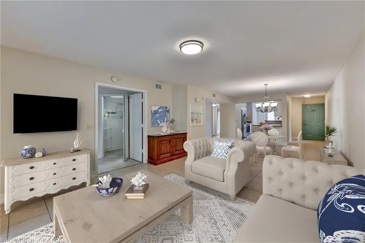 View of Great Room into Master Bedroom. Virtually Staged.