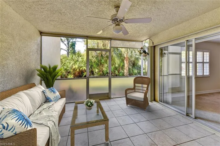 View of Lanai Sunroom. Virtually Staged.