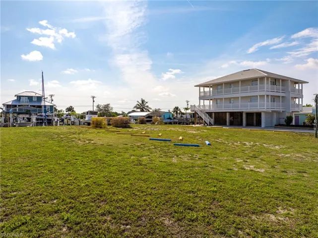 View of green lawn with stairs