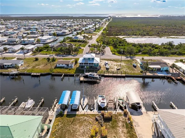 Aerial view of commercial area with a large body of water