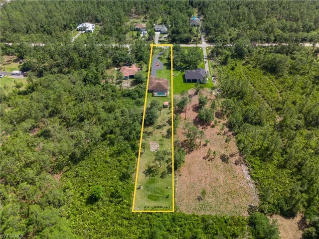 This home is loaded with a variety of fruit trees and robust garden