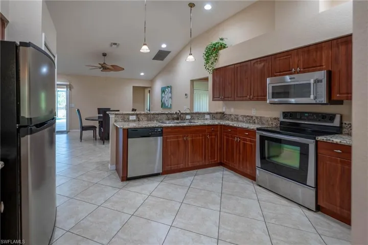 Nice open kitchen with pantry.