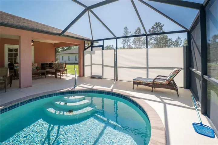Privacy screen pulls over easily to cover entire side.  There are screens on both sides.