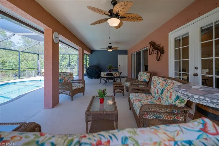 Covered lanai - extra spacious - big enough for outdoor kitchen, seating and dining.