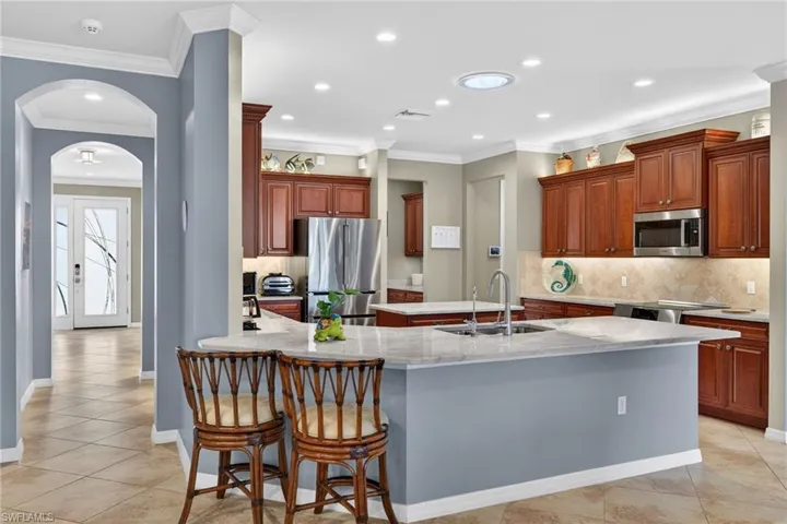 Plenty of Quartzite Countertops and Upgraded Wood Cabinets