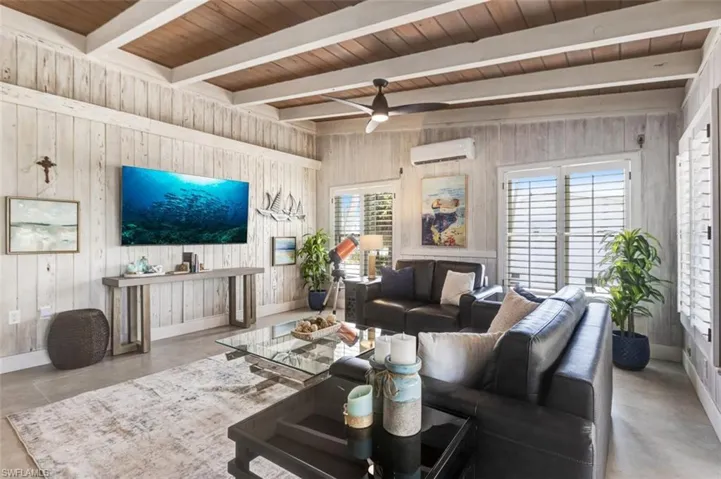 Whitewashed walls for coastal charm and contrasting beams