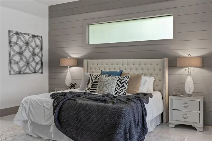 Bedroom with wooden walls