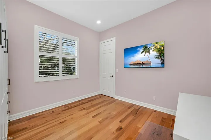 Guest bedroom 2 w/Murphy Bed and hardwood flooring