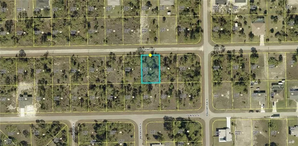 Aerial overview of property's location with property parcel outlined