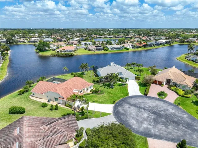 Aerial perspective featuring a nearby body of water