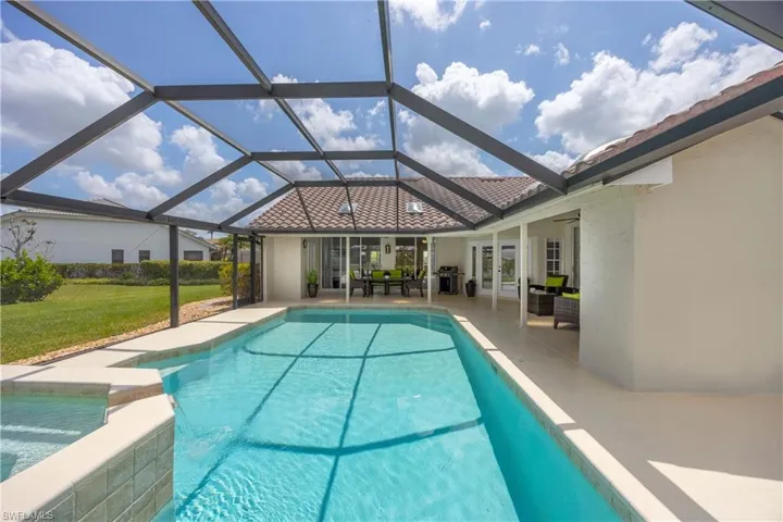 View of swimming pool and large lanai