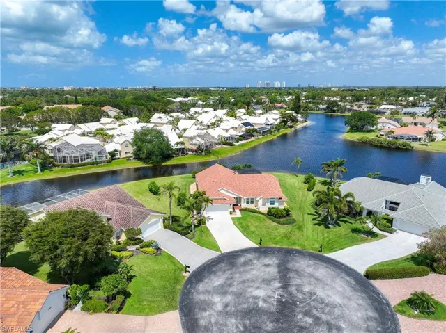 Aerial view of residential area with a large body of water