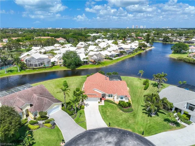 Aerial view of residential area with a nearby body of water