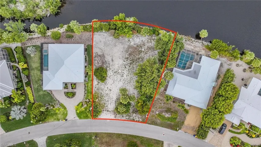 Aerial view of property and surrounding area with property boundaries highlighted