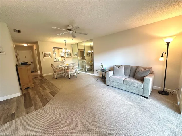 Living Room/Dining Room with ceiling fan - all furniture included