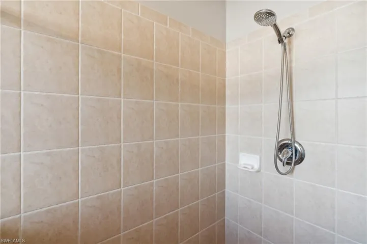 Super clean tiled shower.