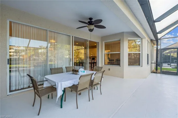 Perfect entertaining Patio area with fresh painted pool deck. Long glass slider doors to living room.