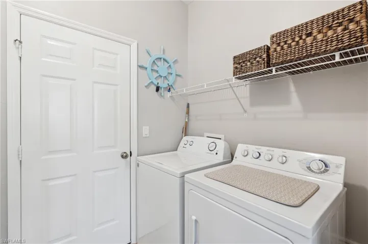Come in through the garage, washer and dryer. Off the kitchen also has a pantry.