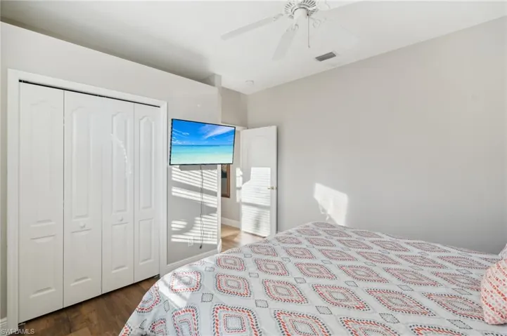 Bedroom featuring closet, and ceiling fan