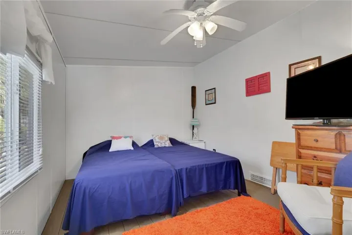 Bedroom featuring a ceiling fan
