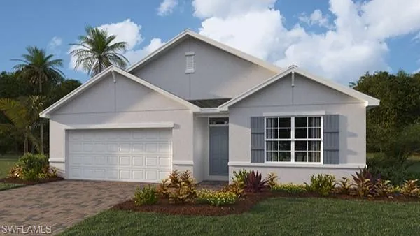 Ranch-style home featuring a garage, stucco siding, and decorative driveway
