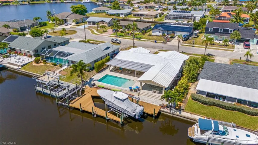 View of pavillion, 2 boat lifts and huge pool and sundeck