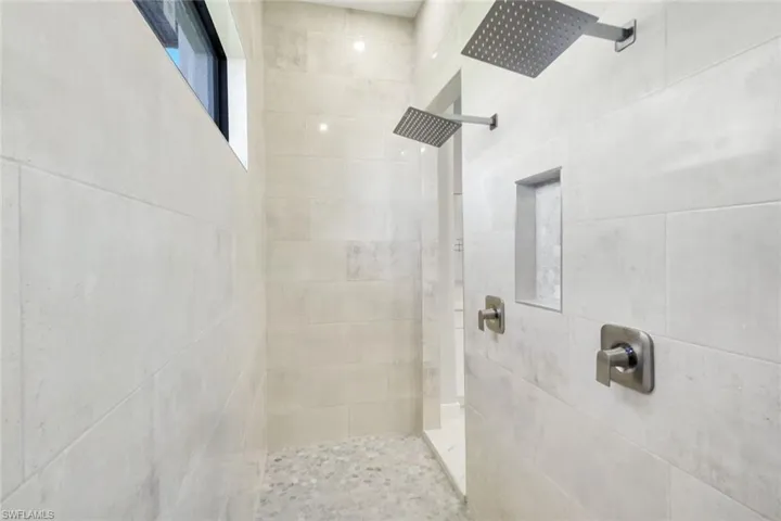 owner's ensuite bath with walk-through shower
