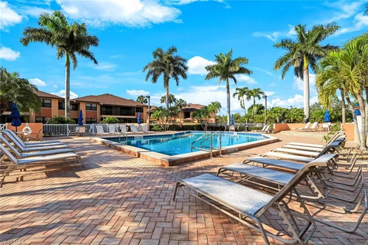 Community pool with a patio area
