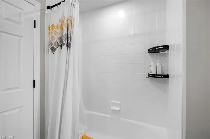 Full bathroom featuring shower / tub combo