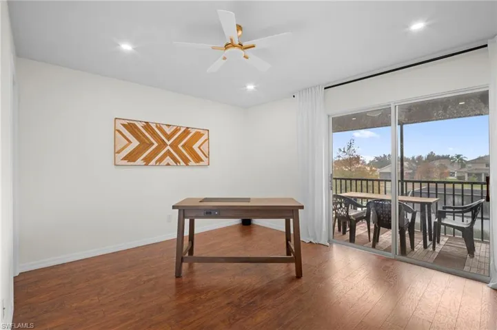Office featuring hardwood / wood-style floors, a ceiling fan, and recessed lighting