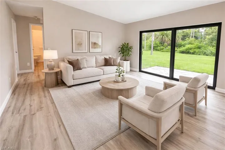 Living room featuring light wood-style flooring