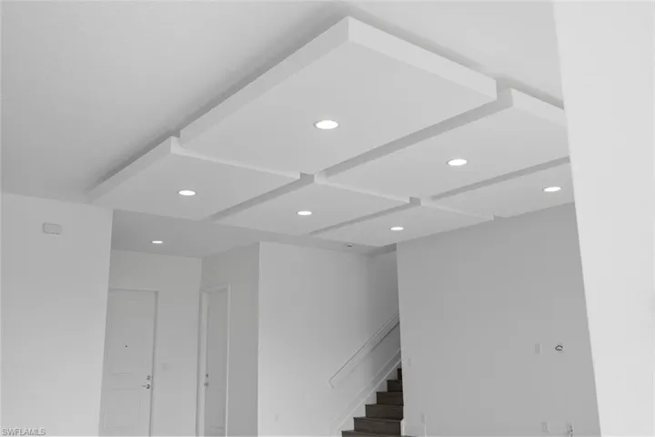 Staircase featuring recessed lighting