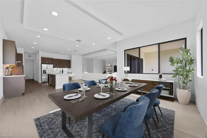Dining area featuring recessed lighting, visible vents, and light wood-style flooring-Virtual Staging