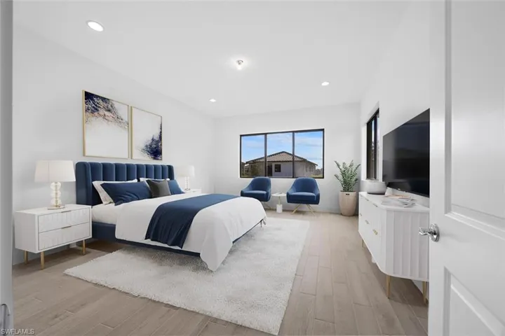 First Floor-Bedroom with recessed lighting and light wood-style flooring-Virtual Staging