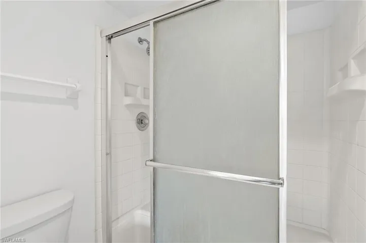 Bathroom featuring toilet and walk in shower