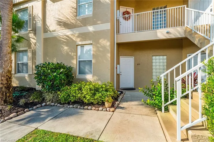 Property entrance featuring a balcony