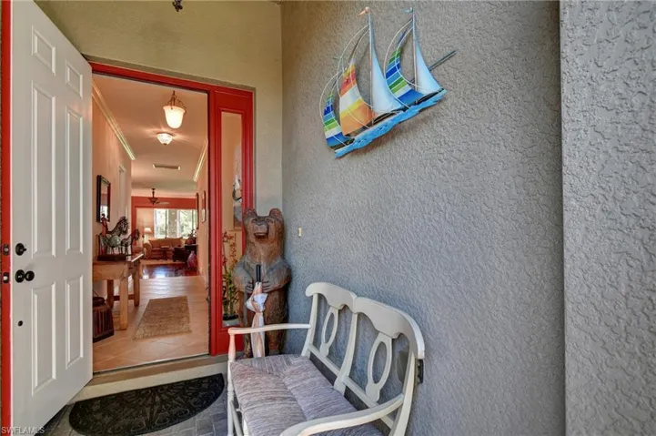 Bear does NOT convey.Screened entry allows for tropical cross breezes in the winter