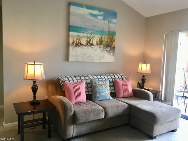 Living room featuring carpet