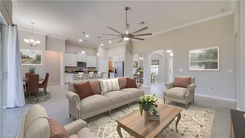 VIRTUALLY STAGED Great Room with high ceilings and Crown Molding.