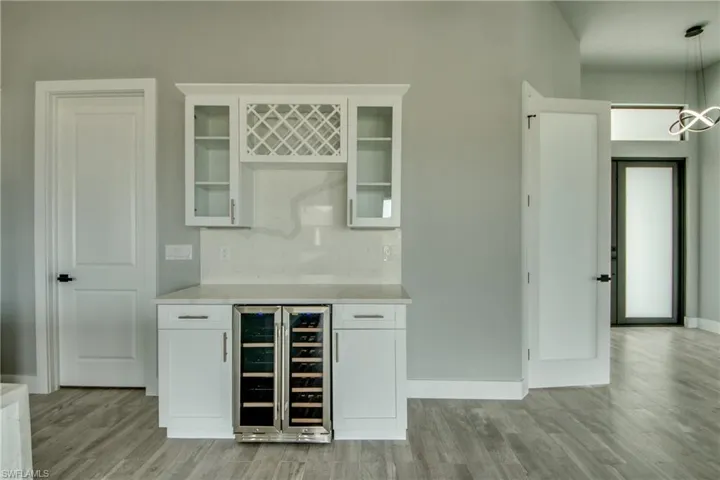 Bar area including a wine fridge
